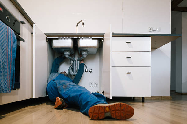 Professional Drain Cleaning technician working in Summerfield, FL